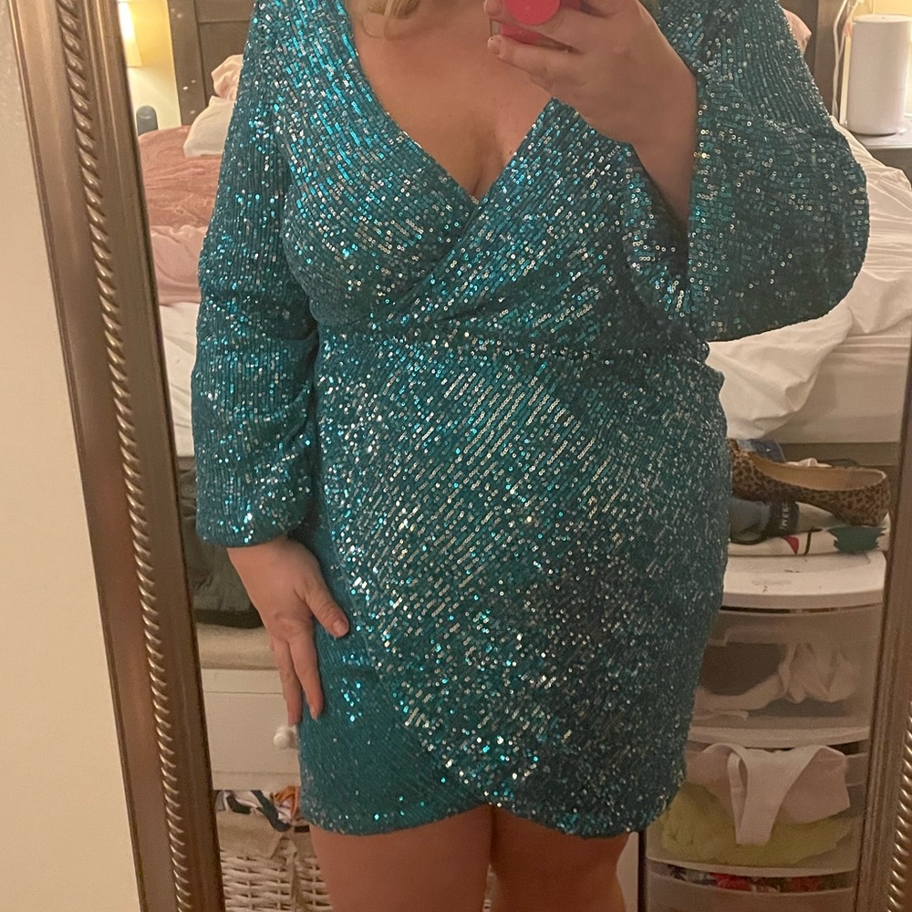 Beautiful aqua sequin open back long sleeve mini dress